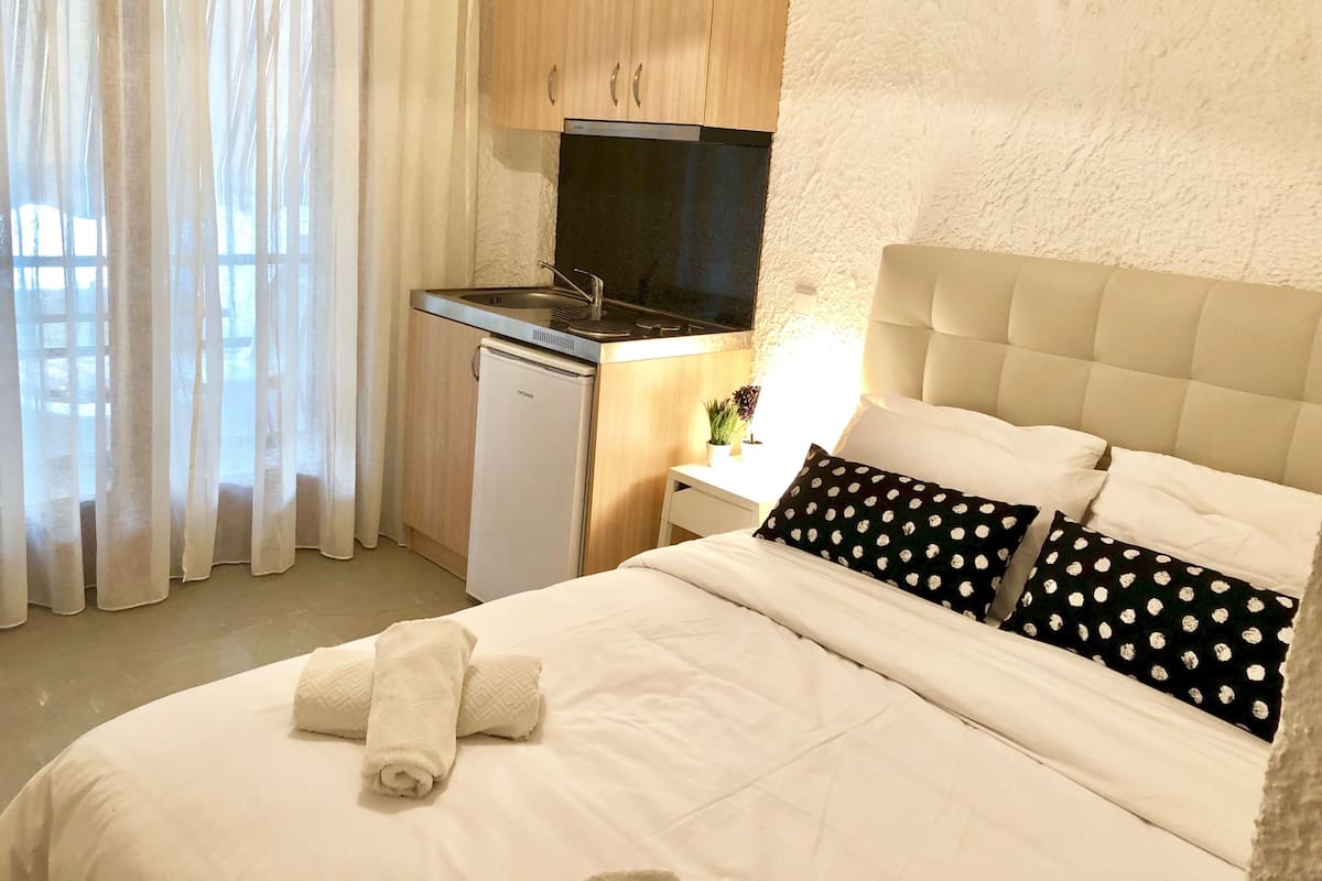 Comfort studio | Lakens van Egyptisch katoen, donzen dekbedden