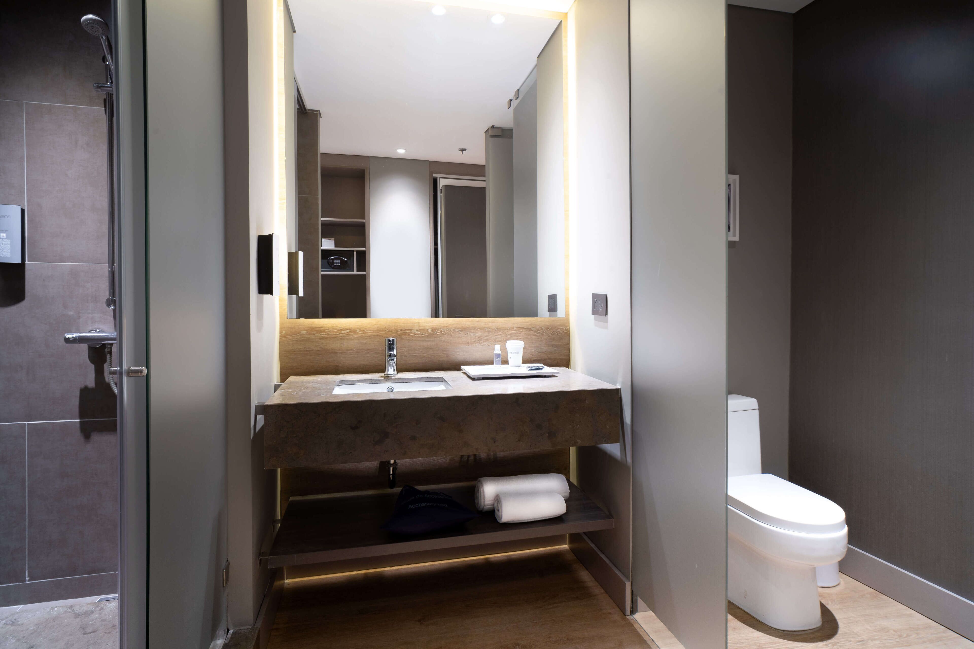 premium twin room | bathroom | free toiletries, hair dryer, towels