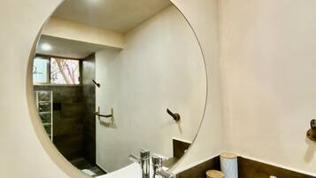 Shower, rainfall showerhead, hair dryer, towels