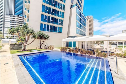 Indoor pool, outdoor pool, pool umbrellas, pool loungers