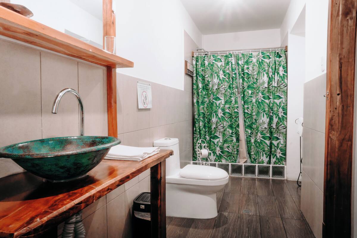 family room | 1 bedroom, frette italian sheets, premium bedding, down duvets