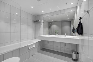 Suite, 1 King Bed, Non Smoking | Bathroom | Hair dryer, towels