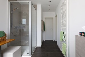 Shower, hair dryer, bathrobes, towels