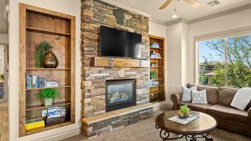 Smart TV, fireplace, DVD player, books