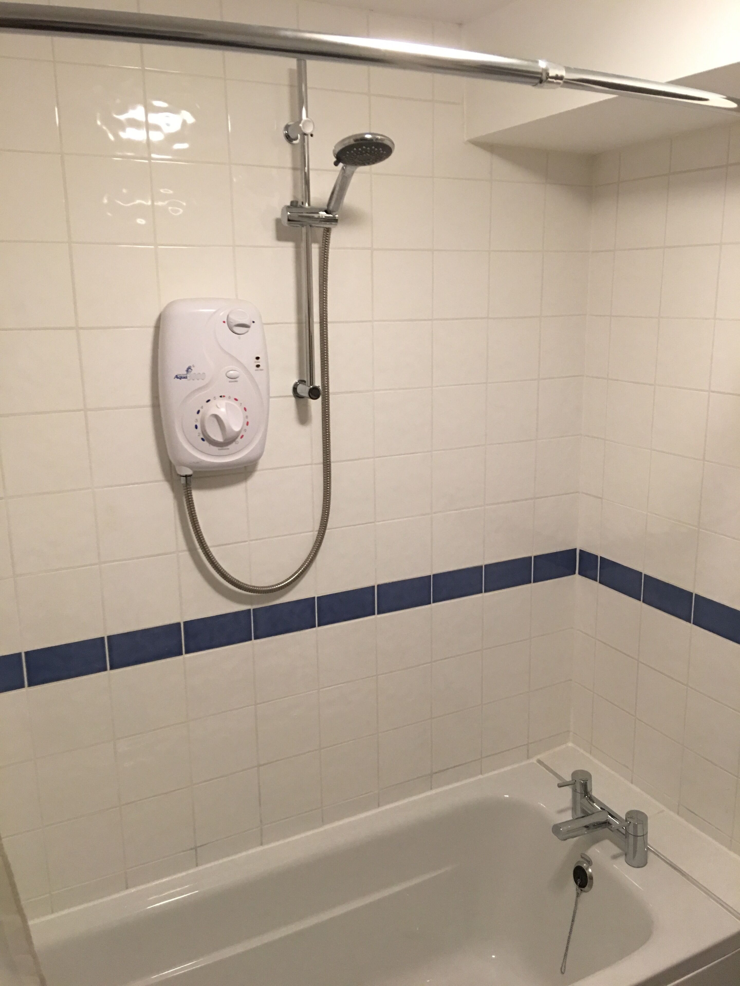 Hair dryer, towels, shampoo, toilet paper