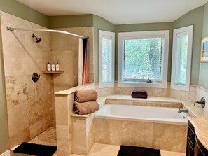Bathtub, jetted tub, hair dryer, towels