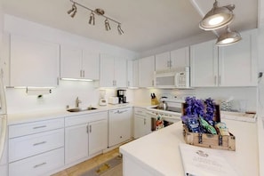 Coffee/tea maker, fridge, microwave, oven