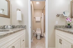 Combined shower/tub, eco-friendly toiletries, hair dryer, towels