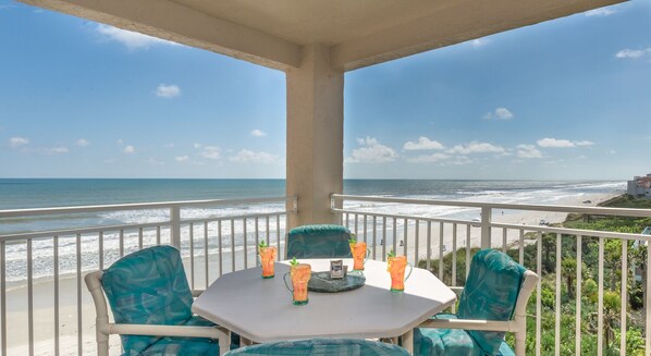 Outdoor dining - Spectacular Beachfront Views from this Tastefully Decorated Condo ~ PH5B Palm House (New Smyrna Beach)