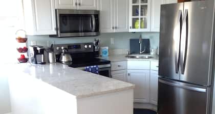 Downtown condo with a great location near waterfront, “a block from the Rock”