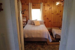 1 bedroom, desk, iron/ironing board, travel crib