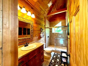 Shower, jetted bath, hair dryer, towels