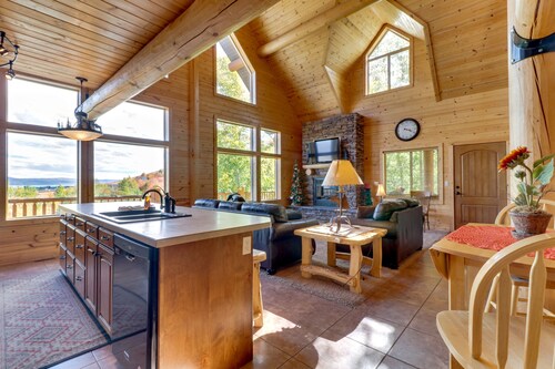 Rustic cabin with lake views from deck w/ grill, foosball, W/D, fireplace