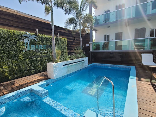 Deluxe Pool View Suite | View from room - Barefoot Caye Caulker Hotel (Caye Caulker)