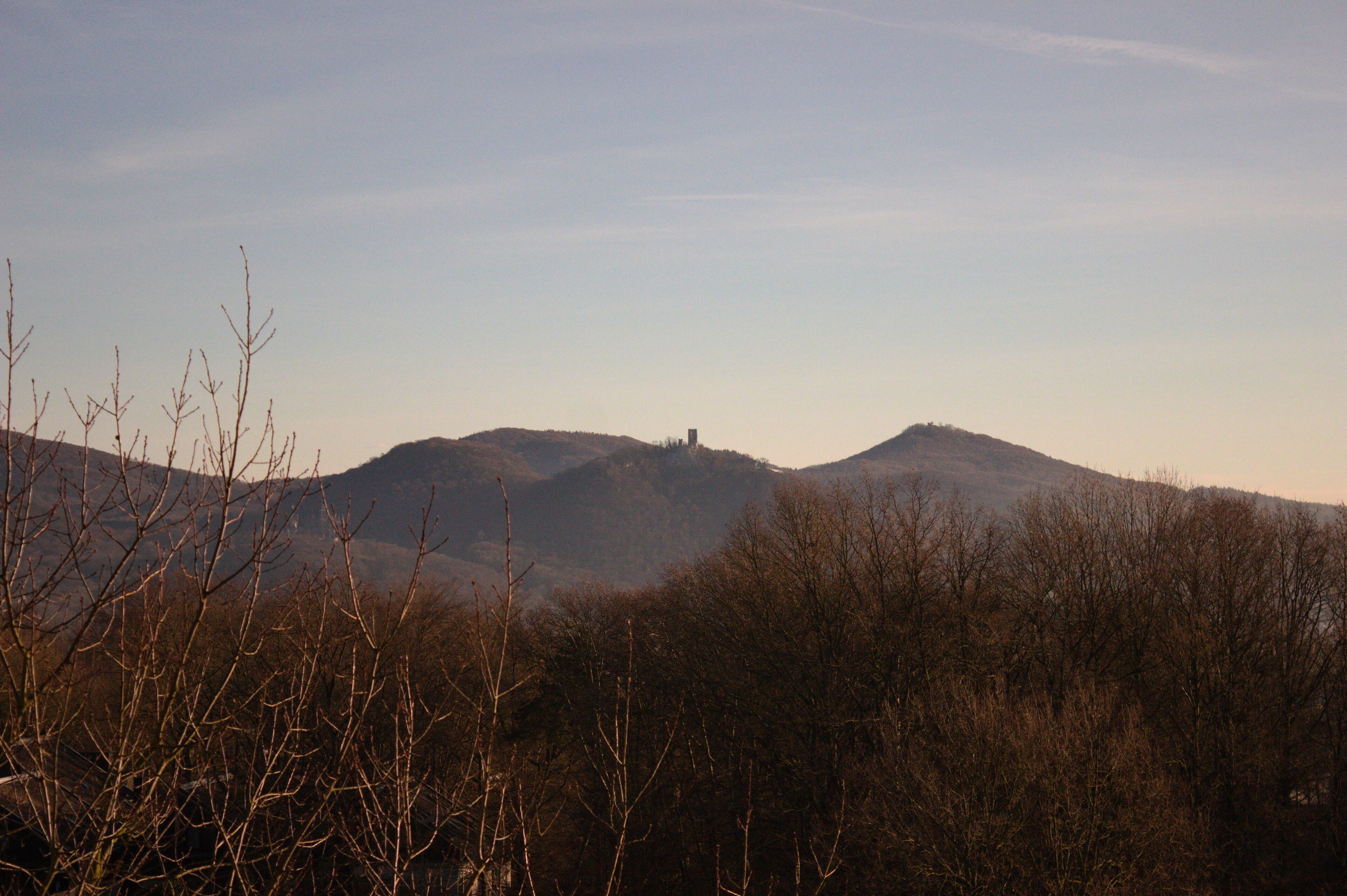 A mountainous landscape with a clear sky.