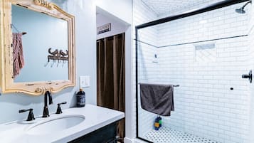 Shower, eco-friendly toiletries, hair dryer, towels