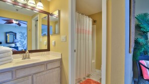 Combined shower/bathtub, hair dryer, towels - Seas the Sunset at Phoenix VIII Unit 1001 (Orange Beach)