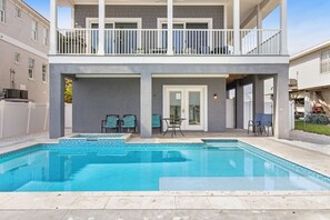 A heated pool - Bayfront Home with Private Pool, Balcony Views & Walkable Beach Access (Bradenton Beach)