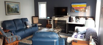 Escapade Nordique (vesi edessä) sur le bord de l'eau 