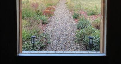 Cozy cabin in a beautiful mountain valley close to hiking, golf, airport, skiing