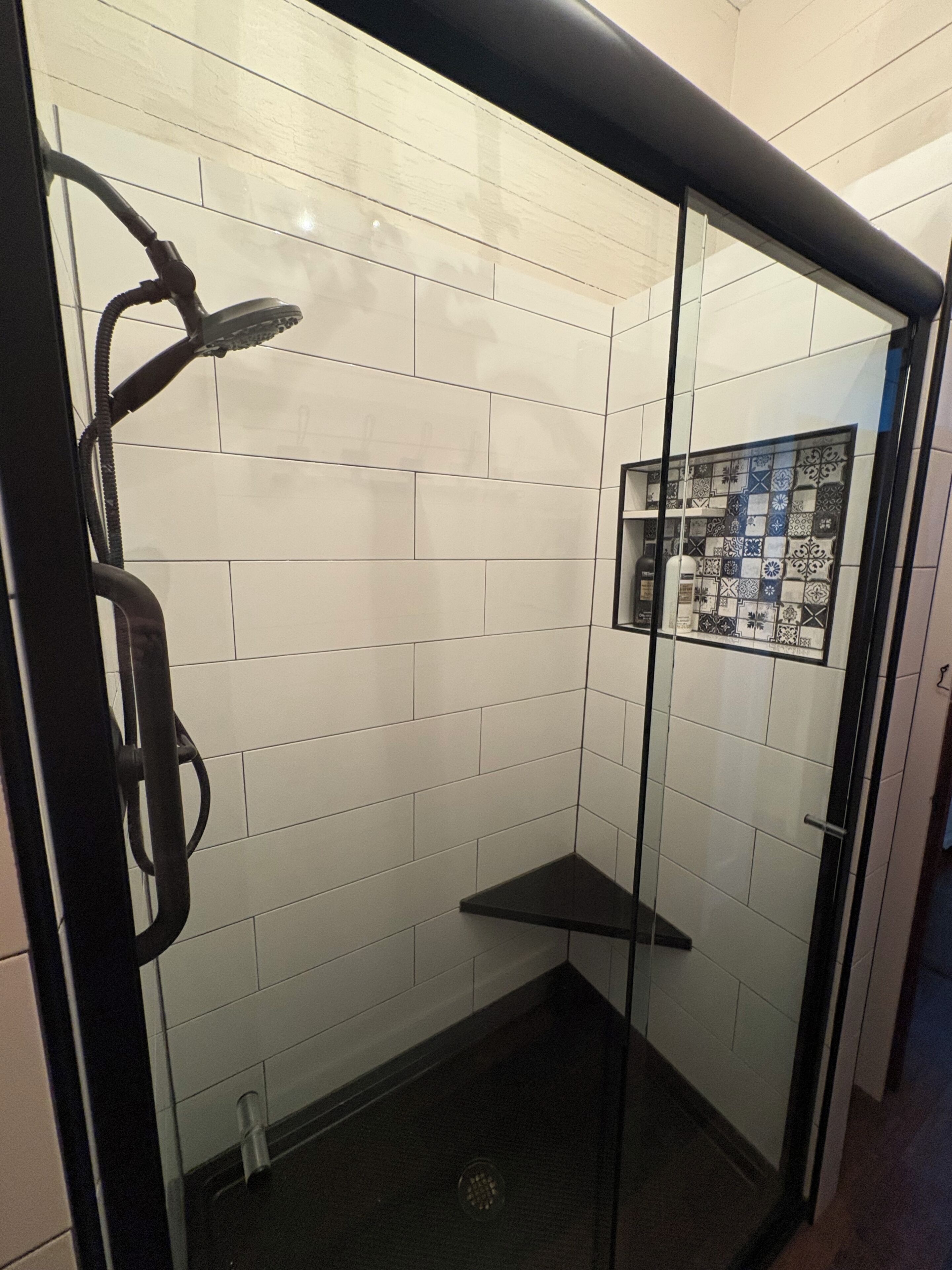 Combined shower/bathtub, hair dryer, towels, soap