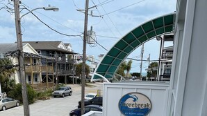 A building entrance with a sign reading "Storebreak Private Residences 40 North Lagoon." - Prime location and the perfect getaway for two (Wrightsville Beach)