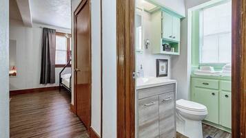 Bathtub, hair dryer, towels