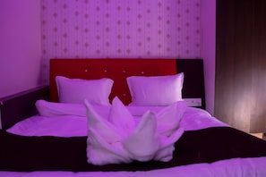 Premium bedding, in-room safe, blackout curtains, soundproofing