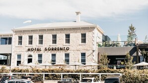 A building with the sign 'HOTEL SORRENTO' indicating a hotel establishment.