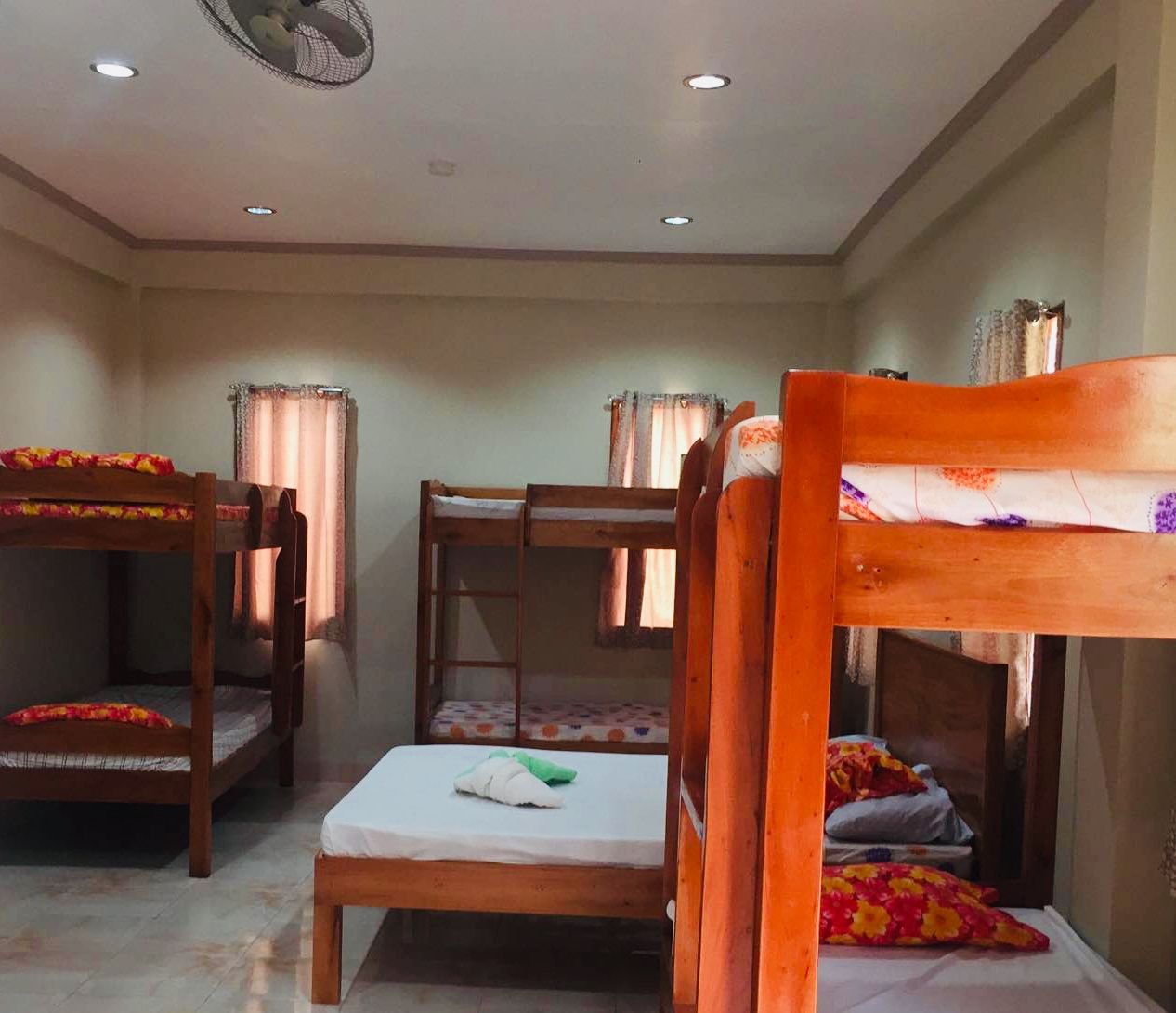 superior shared dormitory, multiple beds, beach view | room amenity