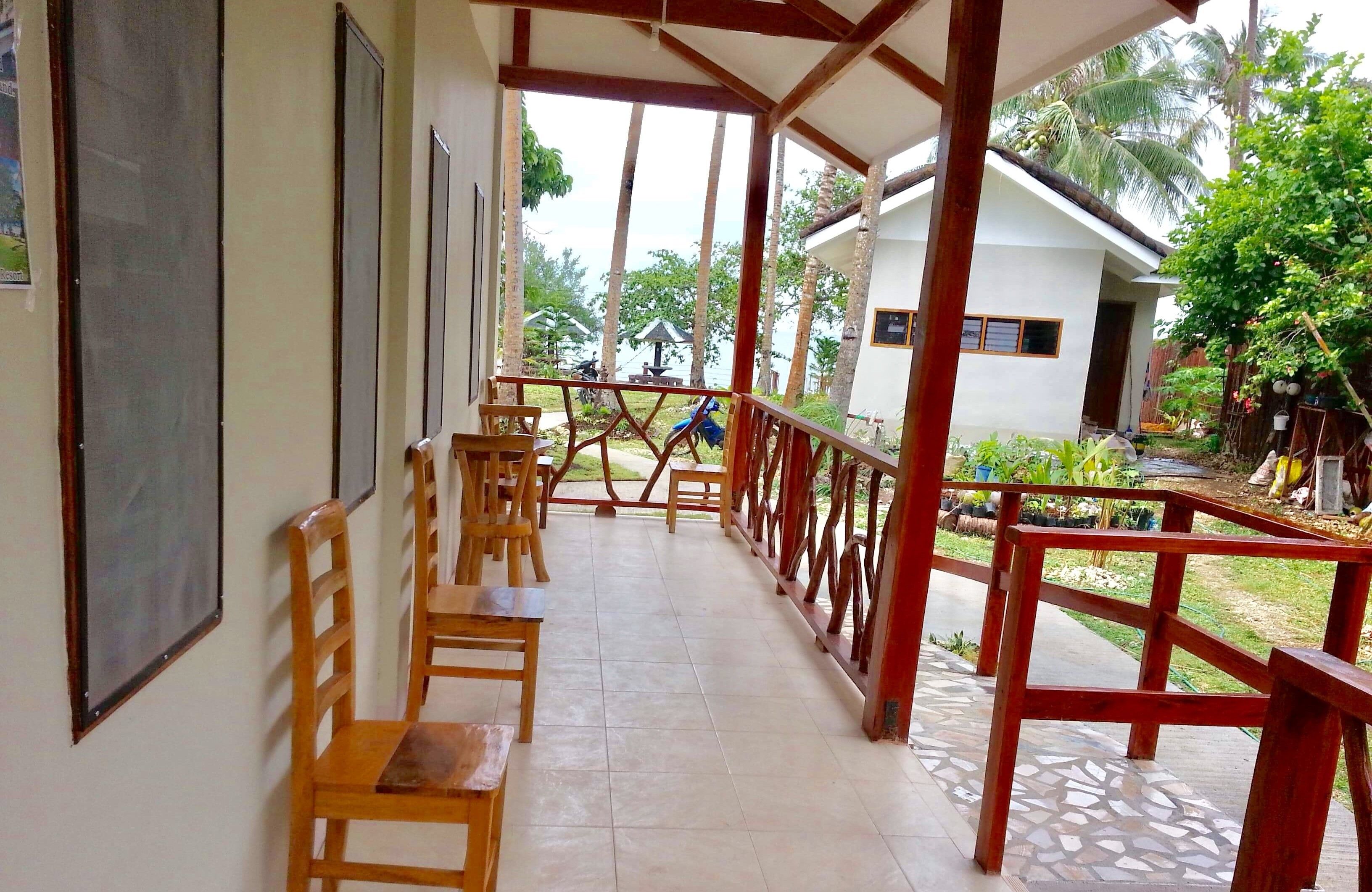 superior shared dormitory, multiple beds, beach view | terrace/patio