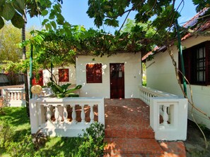 Standard Bungalow, 2 Queen Beds (GDV Twin) | Courtyard view