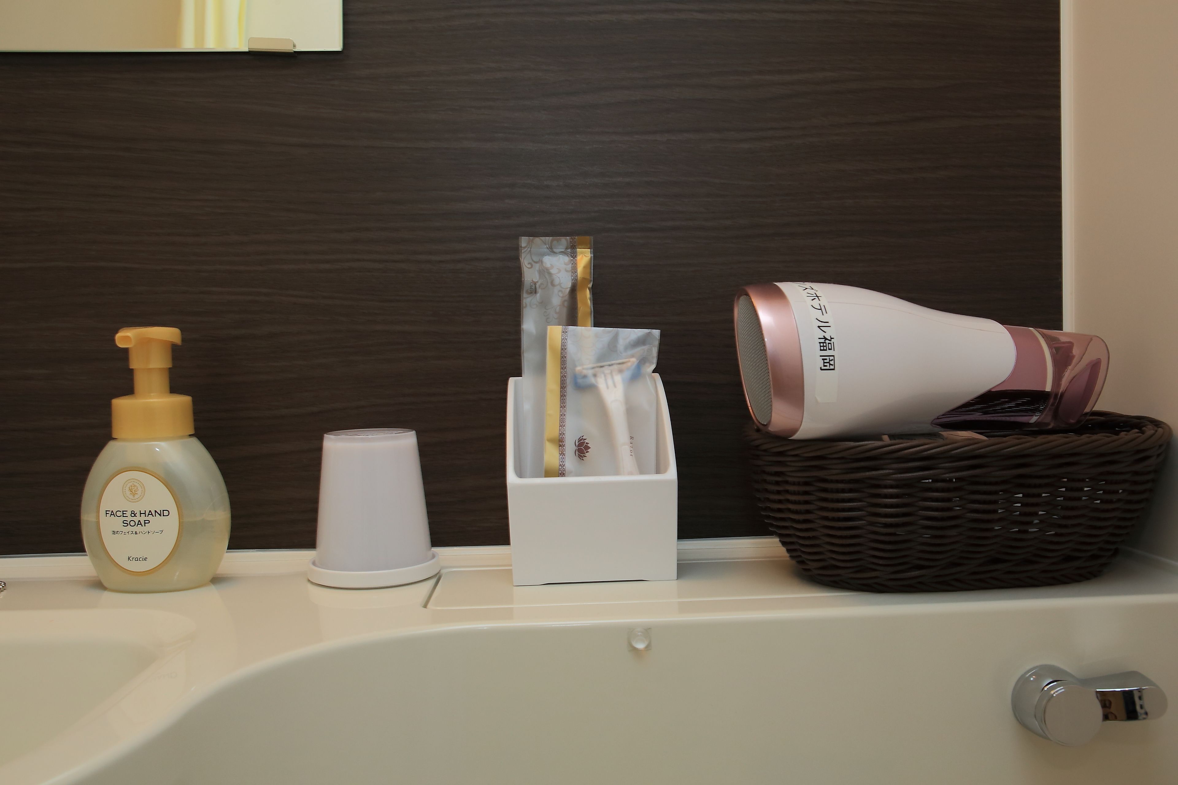 combined shower/bathtub, free toiletries, hair dryer, slippers