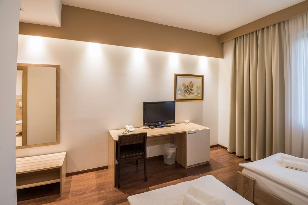 Habitación con 2 camas individuales | Sábanas de algodón egipcio y ropa de cama de alta calidad