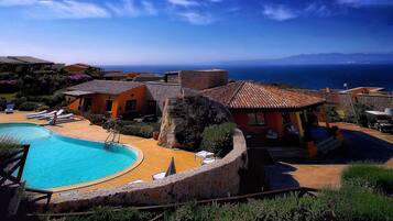 Outdoor pool, open 9:00 AM to 9:00 PM, sun loungers