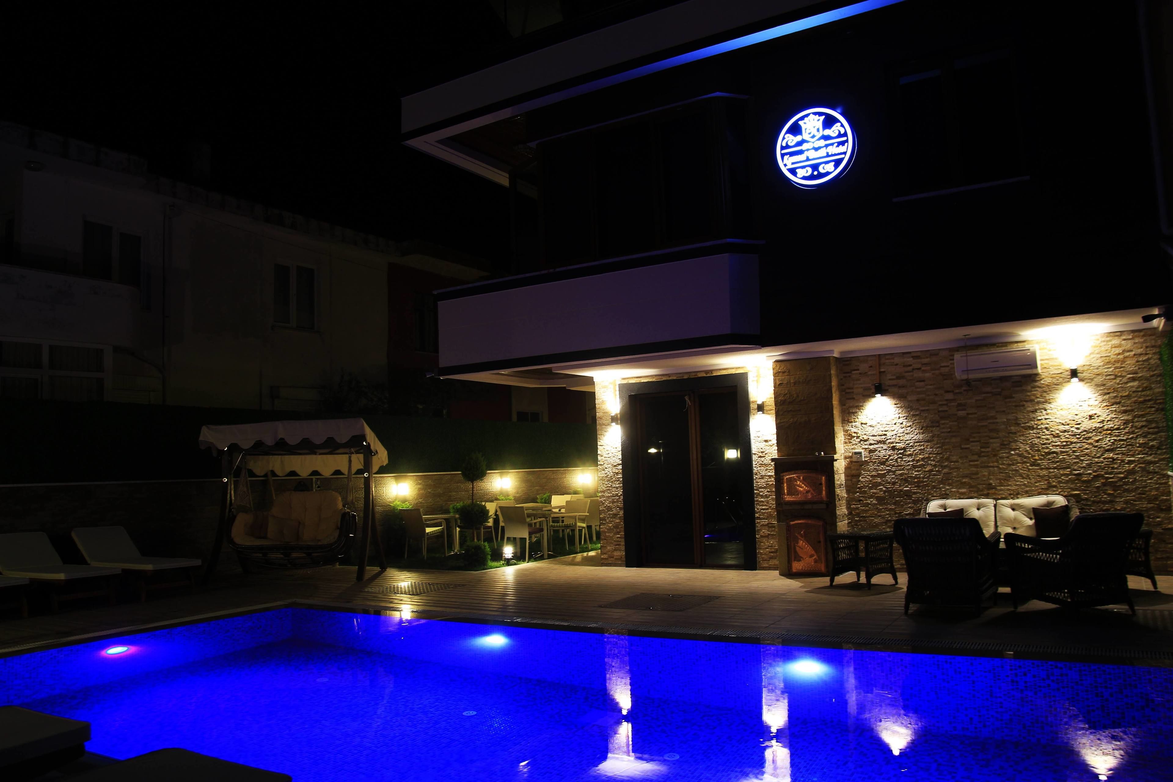 Outdoor pool, open 10:30 AM to 8 PM, pool umbrellas, sun loungers