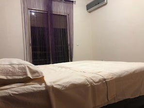 Apartment, 3 Bedrooms | Blackout curtains, iron/ironing board, free WiFi, bed sheets