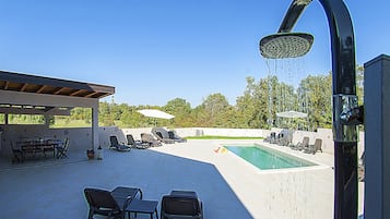 Seasonal outdoor pool, free pool cabanas, pool umbrellas