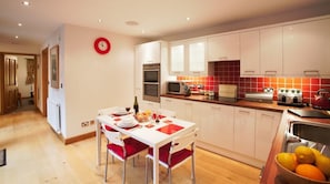House, Multiple Beds | Private kitchen