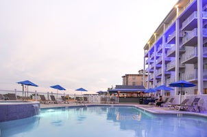 Seasonal outdoor pool, pool umbrellas, sun loungers