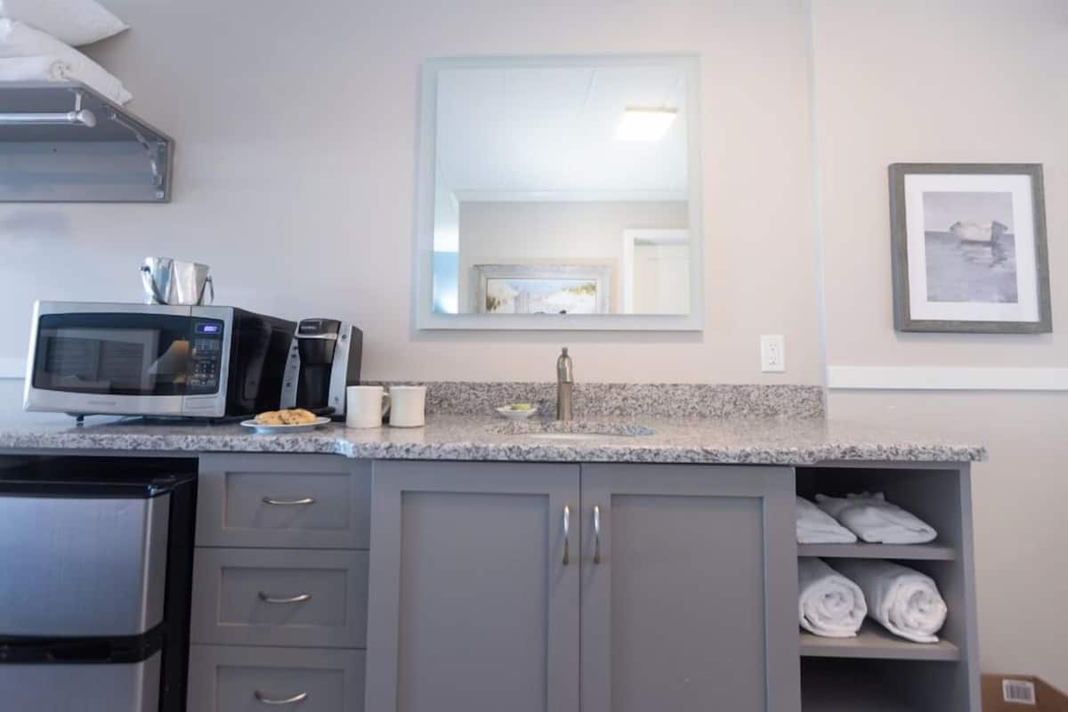 standard room, 2 double beds, non smoking, ocean view | blackout curtains, iron/ironing board, bed sheets, wheelchair access