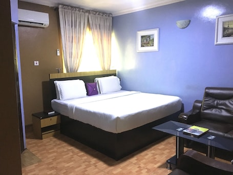 Deluxe Room, 1 Double Bed, Non Smoking | Desk, laptop workspace, free WiFi, bed sheets