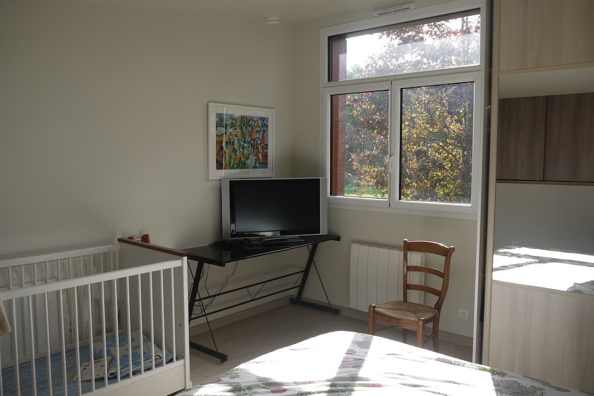 Chambre Confort Double ou avec lits jumeaux, 2 chambres, non-fumeur, vue jardin