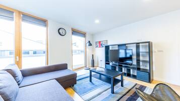 Comfort appartement | Woonruimte | Flatscreentelevisie