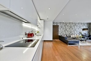 Apartment, 1 Bedroom | Private kitchen | Fridge, microwave, oven, stovetop
