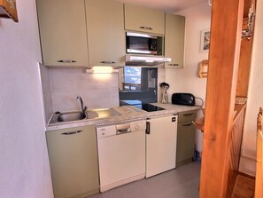 Fridge, microwave, dishwasher, coffee/tea maker