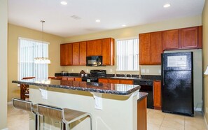 House, 4 Bedrooms | Private kitchen | Full-size fridge, microwave, oven, stovetop