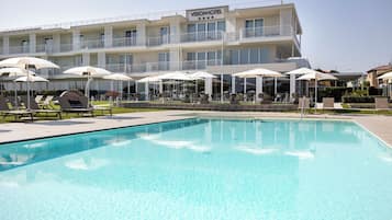 Outdoor pool, pool umbrellas, pool loungers