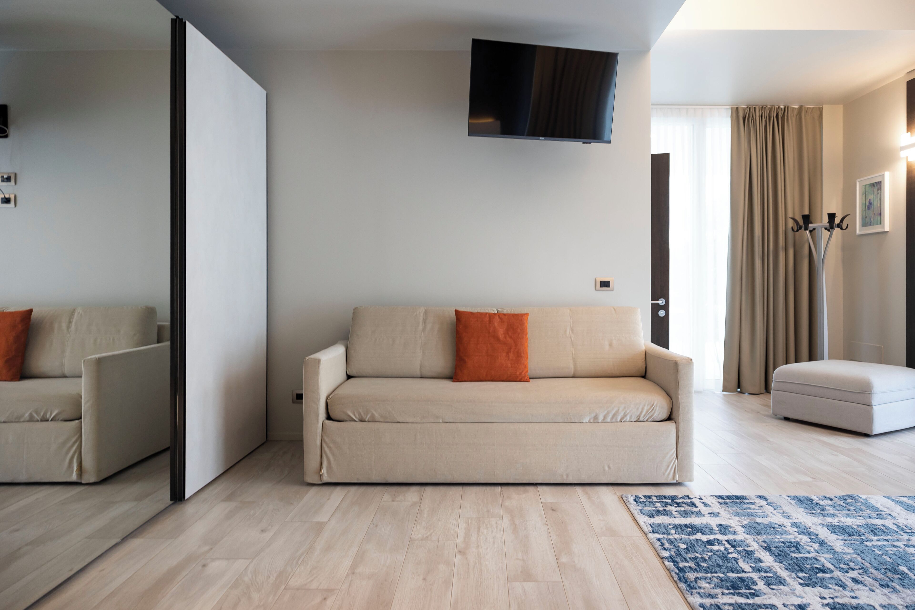 garden deluxe room | living area | 40-inch flat-screen tv with digital channels