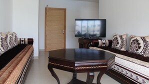 Appartement Deluxe | Coin séjour | TV connectée